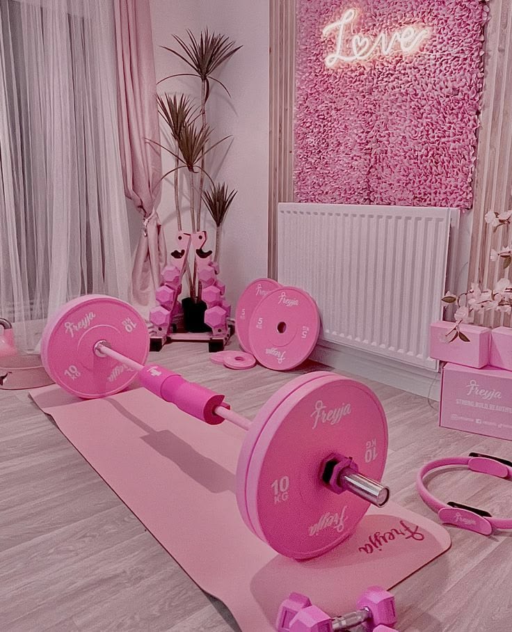 Pink home workout room representing wellness and discipline